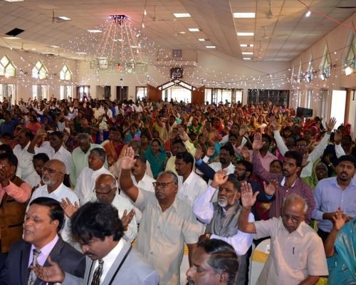 Church praying for Pastors